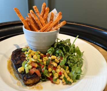 Blackened swordfish with sweetcorn salsa and sweet potato fries