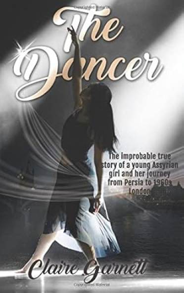 Book cover of "The Dancer" by Claire Garnett, featuring a silhouetted woman dancing in a spotlight, with text detailing her journey from Persia to 1990s London.