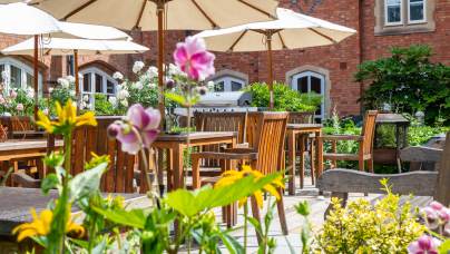 Summer gardens and terrace on the blurred background 