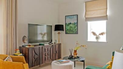 Lounge with TV cabinet and chairs
