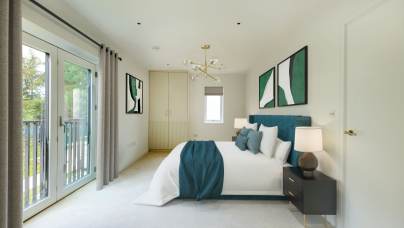 Modern bedroom with a large bed, teal and white bedding, abstract artwork, a chandelier, and glass doors leading to a balcony. Neutral walls and carpet complete the look.