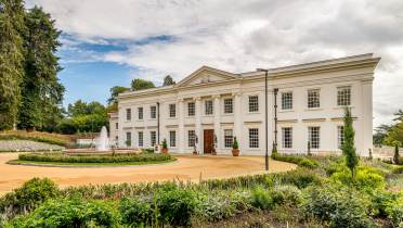 Country mansion house with fountain