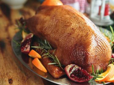 Perfectly cooked goose with trimmings