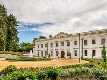 Country mansion house with fountain