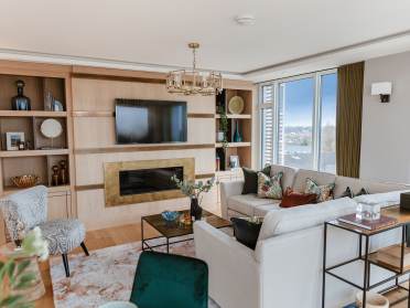 Corner sofa and wall-mounted TV