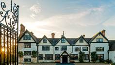 Front view on a Tudor style manor house