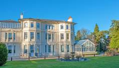 Mansion house and grounds with fountain